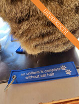 NO UNIFORM IS COMPLETE WITHOUT CAT HAIR