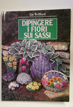 Dipingere i fiori sui sassi