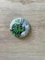 Badge dinosaure