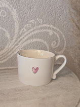 Tasse mit einem rosa Herz