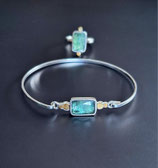Bezauberndes Schmuckset Ring mit Armreif aus Silber mit feinen Goldakzenten und Kyanit