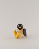 Pinguinkind sitzend