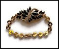 Bracelet strass noirs chaine gros maillons dorés BRA022
