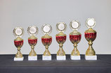 #2025-08-08 Ständer Pokal in 6 Größen Ausführungen, in Goldfarbe mit Rotem Cup, weißer Sockel und Deckel