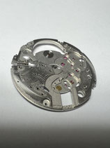 Jaeger Le Coultre 900 etc. - Teil 100 - JLC Teil 10020 - Hauptplatine mit Datumarretierung (2575+2576) und Sperrklinkenfeder - gebraucht - used - guter Zustand - good Condition