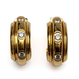 18 Karaat gouden oorbellen bezet met diamanten, PIAGET, model 'Possession', 1991.