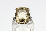 Steltman, 14 kt witgouden cocktailring bezet met grote lichtgele citrien en diamanten, ca.1935.