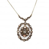 14 karaat goud met zilveren hanger bezet met roosdiamanten aan 18 karaat witgouden collier, Holland ca.1900.