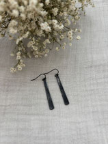Black brushed stick