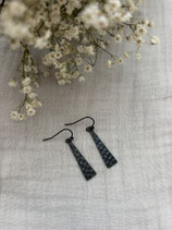 Black hammered triangle