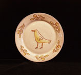 Plate with bird with blue shoes