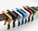 Capodastres universel pour guitare classique, folk, electrique ( manche plat ou arrondi)
