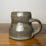 mug with celadon on dark clay
