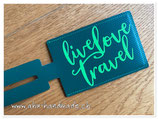 Kofferbeschriftung dunkelgrün "live love travel"