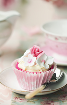 Cupcake mit Blumen und Buttercreme