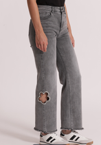 Jeans con fiore
