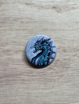 Badge dragon bleu