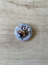 Badge panda roux