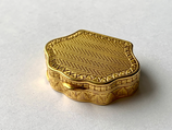 18 Karaat gouden pillendoos bewerkt met guilloche en randversiering.