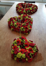 kistbedekking in rood/groene tinten
