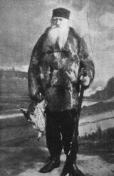 Heinrich Gätke (1814-1897) mit Flinte, erlegten Vögeln und weißem Bart.