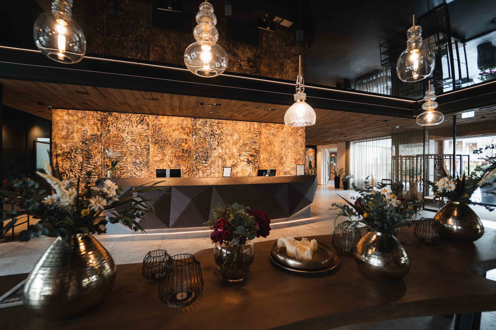 The elegant reception area of the Hochkönigin Wellness Hotel in Maria Alm, Salzburg, with its stylish décor