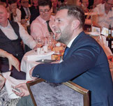 Conference delegate using an audience response system clicker or handset