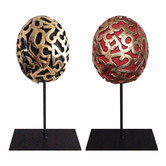 Paolo Grassi Eggs, twin bronze sculptures with numeric engravings on stands
