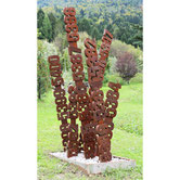 Paolo Grassi – Piera, vertical iron sculpture with numeric pillars emerging from a shared base.