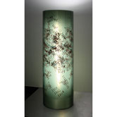 Illuminated vertical cylinder by Paolo Grassi for UBS Lugano, featuring engraved red numbers on translucent surface.