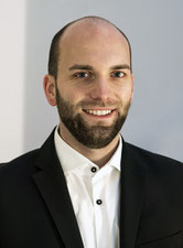 Symbolfoto: Ein Portraitfoto des Geschaeftsfuehrers von Teamworker