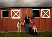 Christine Beatty, center, is mom to Megan, left, who has Down syndrome and ADHD, and Mia, who has cerebral palsy. 