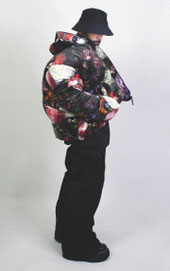 model with wide pants and big puffer jacket