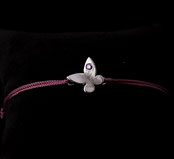 Bracelet papillon pour femme fait à la main en France en argent 925 et zirconium rose sur cordon
