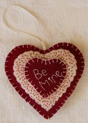 Wool applique valentine ornament from 100% hand-dyed wool.
