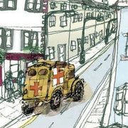 Ambulance tootling up urban street