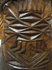 Stem of a beautifully carved djembe in Guinea