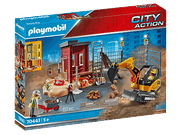 Minibagger mit Baugrube und Bauarbeiter.