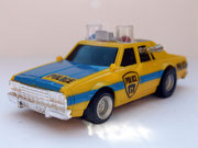 AURORA AFX Chevy Police gelb/blau Variante 1