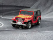 AURORA AFX Jepp CJ-7 rot/gelb