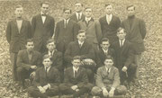 1913 Vassar High School Football Team with Lloyd Botimer, team captain, pictured in center