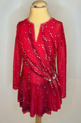 Kürkleid mit aufgenähten Bändern