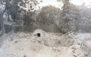 An Anderson shelter at Cottesbrook Road. A hit as near as this must have caused blast injuries, even though the shelter was still standing.