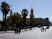 view of La Trattoria del Monasterio with Plaza de Armas in the foreground