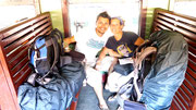 Dingo and Fudgie on the train heading from Kandy to Nuwara Eliya