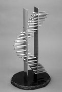 “Space - floating prism  (K-34)” 　　　　H.50x28x25cm / stainless steel / 1989