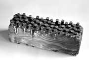 "Face - vestiges (痕跡) (K-19)" H.8x8x25cm / brass, wood / 1987
