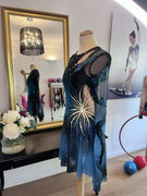 Kürkleid mit Schlangenapplikation