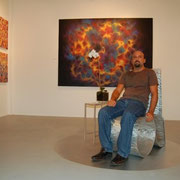 Sitting in front of "ENERGY" at the Milou Gallery in Miami. 2008.