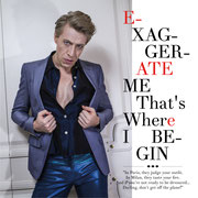 Ottaviano Blitch, Italian actor and performer, glamour editorial portrait in grey suit with glossy blue trousers and open shirt, attore performer italiano ritratto glamour moda
